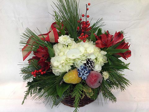 flower arrangement. The fruit is not real