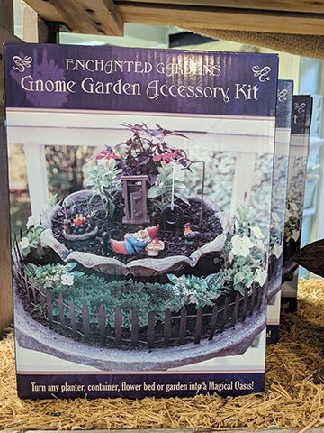 miniature garden gnome with other accessories